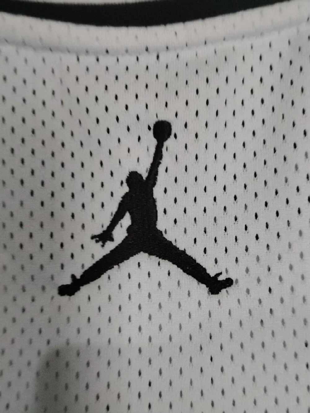 Jordan White Mesh Basketball Jersey with Red Accents
